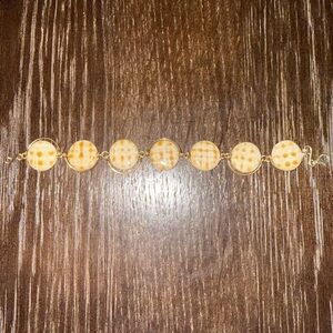 Elegant Gold and Cream Bracelet